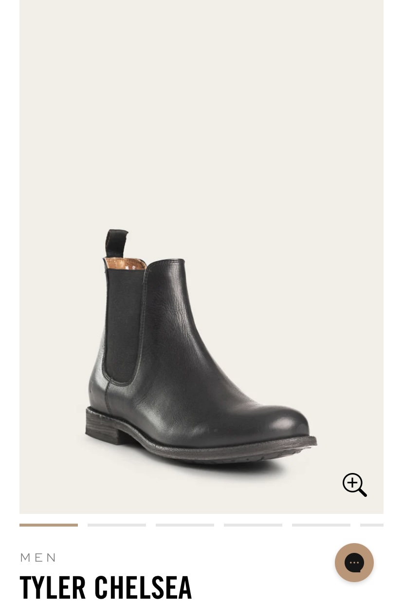 Screenshot from a website of a single black chelsea boot on a cream colored background. The listing says 'Frye Men's Tyler Chelsea Boot'